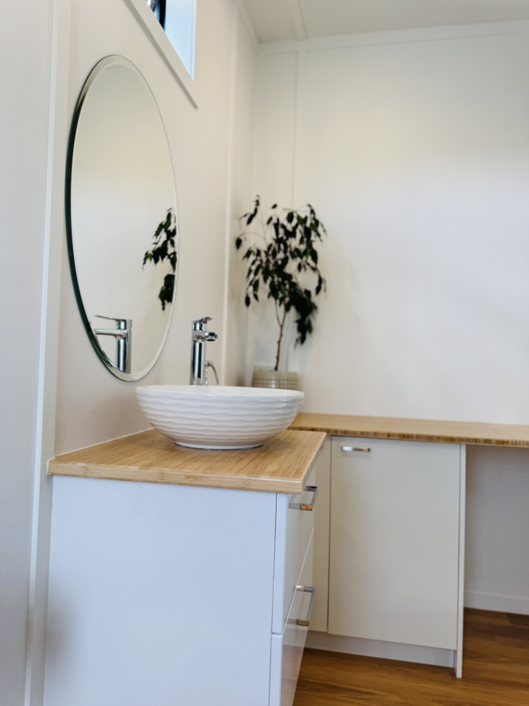 Ceramic bowl basin, timber benchtop & LED mirror